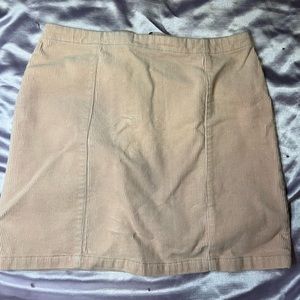 Pale pink mini skirt